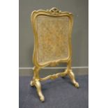 A mid 19th century giltwood fire screen, 107 x 60cm