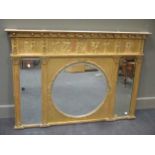 A Regency style neo-classical gilt gesso overmantel mirror, with circular fielded central plate