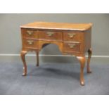 A Queen Anne style walnut low-boy, with five drawers, on cabriole legs, 79 x 100 x 50cm