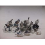 A collection of twenty-five Copenhagen porcelain models of birds