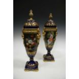 A pair of blue and gilt serves style porcelain vases, 60cm high
