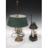 An engraved lacquered-brass four-branch lampe-bouillotte with adjustable green-tôle shade;