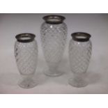 Three matching silver mounted cut glass vases