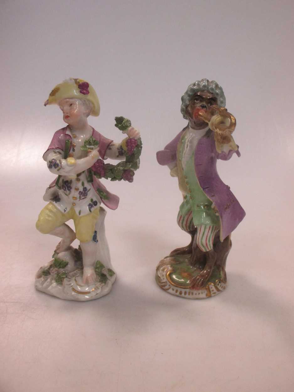 A 19th century Vienna porcelain figure of a monkey playing a trumpet, beehive mark; an 18th - Image 2 of 20