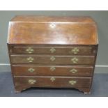 A Victorian oak bureau, with fall front and four drawers under on bracket feet, 99 x 109 x 53cms