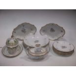 A part service of 19th century tableware decorated en grisaille with bouquets of flowers and buds,