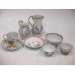 An assortment of antique porcelain, including an 18th century cup and saucer decorated in the manner
