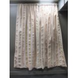 A pair of verticle striped cream coloured curtains (lined) each curtain measures approximately