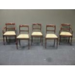 Five late Regency mahogany bar back dining chairs including 2 armchairs, on baluster turned front