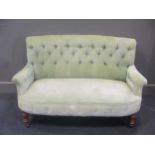 A small late Victorian stained-beech sofa,