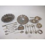 Two silver tea strainers, together with some assorted silver flatware and a silver waiter 12.5ozt,