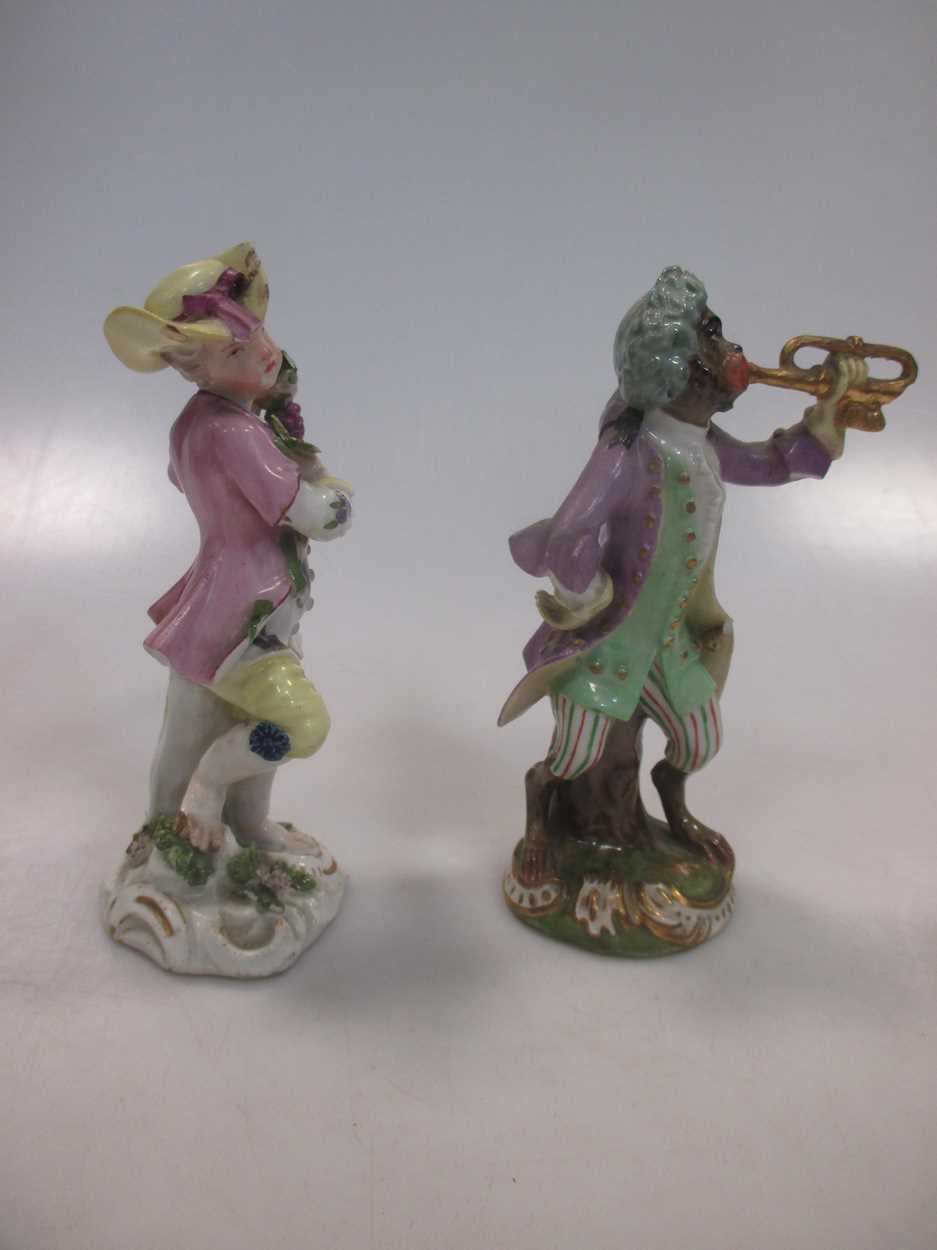 A 19th century Vienna porcelain figure of a monkey playing a trumpet, beehive mark; an 18th - Image 18 of 20
