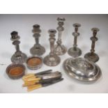 A small collection of silver plated wares including candlesticks