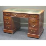 An Edwardian mahogany twin pedestal desk comprising of nine drawers, 74 x 67 x 124cm