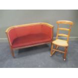 A 19th century inlaid settee, 127cm wide; together with a single cane seat rocking chair (2)