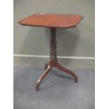 A Regency mahogany table on tripod legs 69.5 x 57 x 56cm