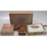 A collection of Cuban cigars in three boxes (part used): Bolivar 5 Tubos No. 2; Romeo Y Julieta 9 (