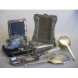 2 silver photograph frames, together with a cased set of six bean end coffee spoons, some silver