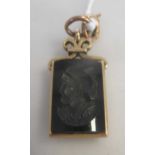 A rectangular onyx centurion intaglio fob, tested as 18ct gold, gross weight 5.9g