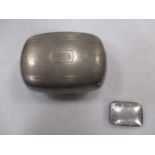 A modern silver pillbox together with a continental metalwares hammered finished snuff box (2)