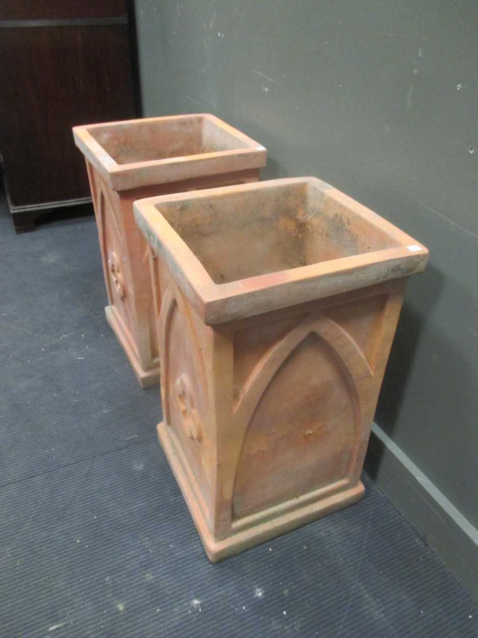 A near pair of terracotta planters decorated with gothic arches and quatrefoil 70.5 x 41 x 43cm - Image 2 of 5