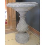 A Haddonstone composite Georgian design bird bath 93cm high and 69cm diameter