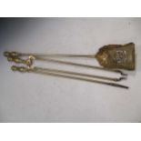 A set of brass irons, 19th century