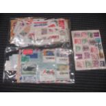 Unused sheets and part sheets of UK commemorative stamps, c.1970s and 1980s, a box of postcards,