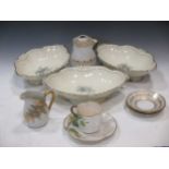 A Limoges Delvaux part coffee service together with a quantity of porcelain tea and coffee part