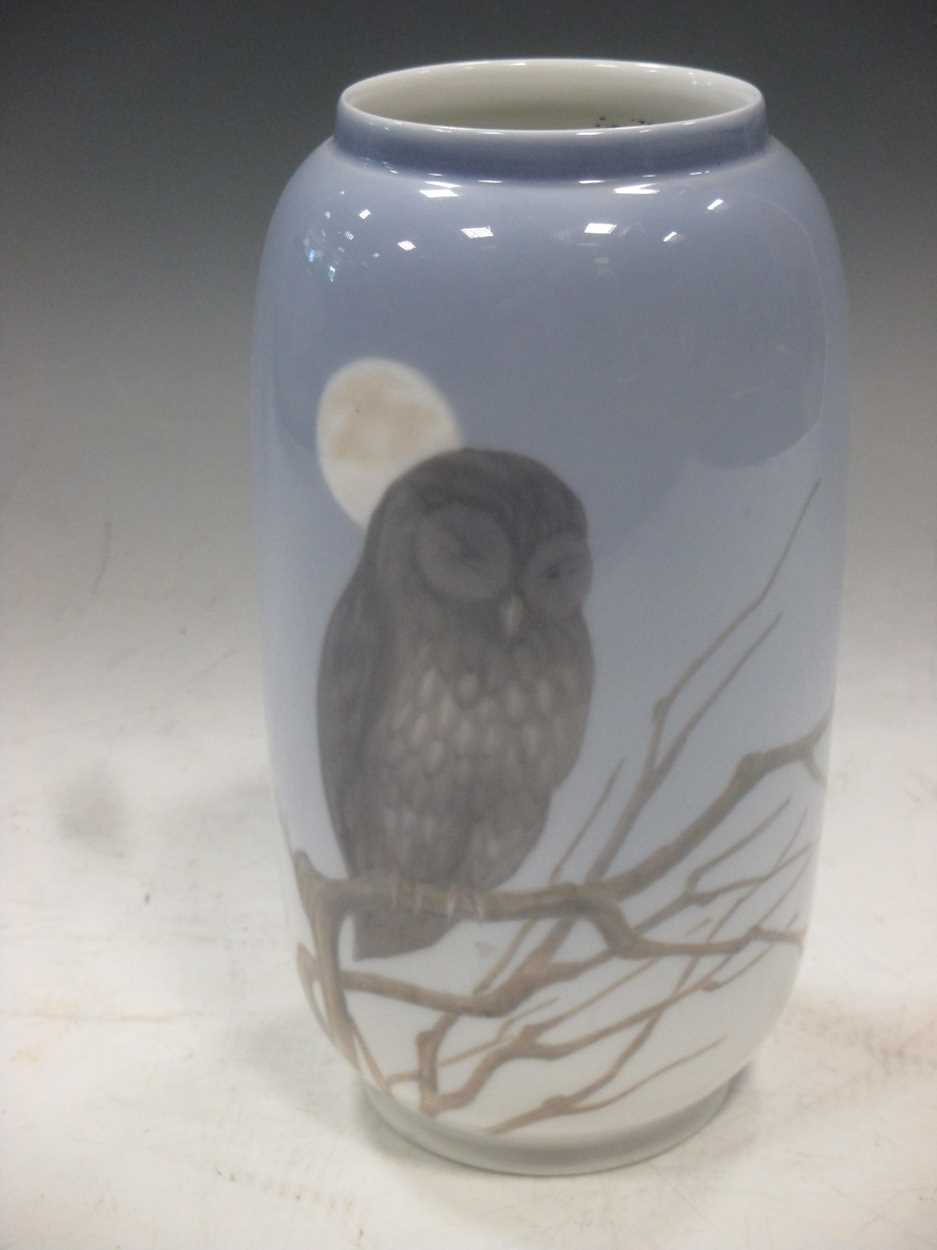 A Royal Copenhagen porcelain vase decorated with a moonlit owl, 21cm high