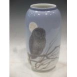 A Royal Copenhagen porcelain vase decorated with a moonlit owl, 21cm high