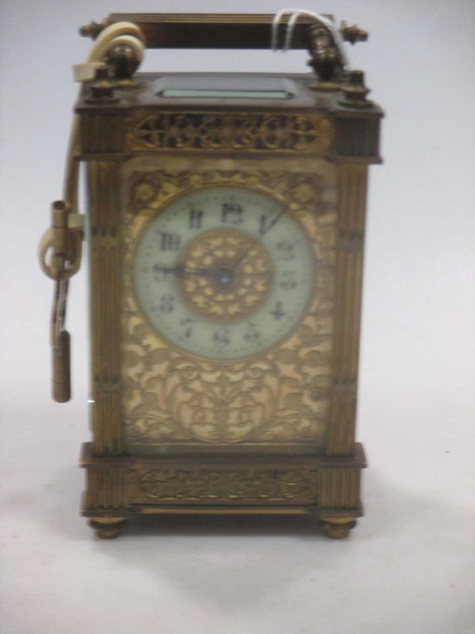 A Late Victorian carriage clock with a replacement escapement, a maker's name is not stated, 13.