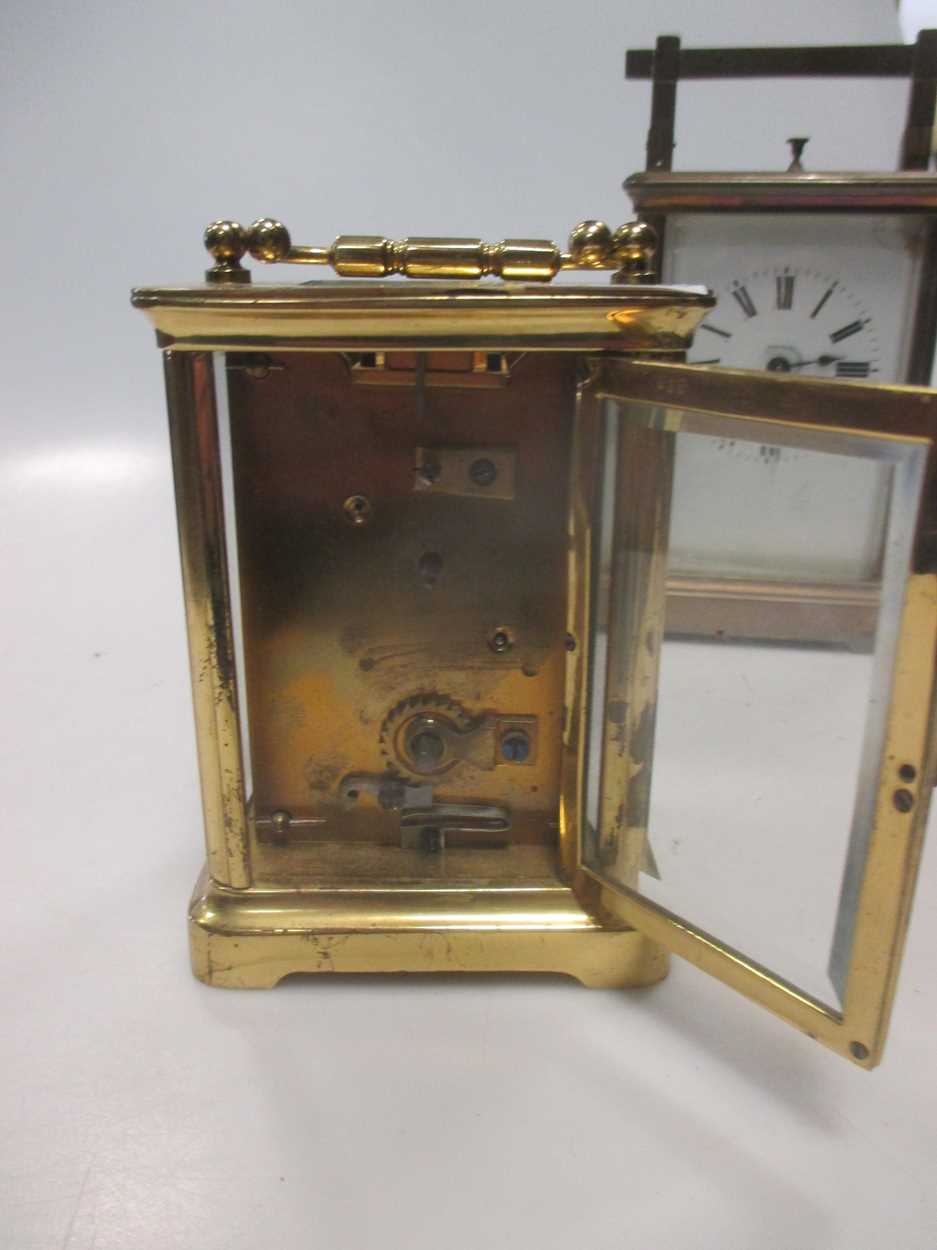 An Edwardian brass carriage clock, 13cm high and a mid 20th century carriage clock (2)Footnote: - Bild 4 aus 6