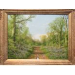 Caesar Smith, a pair of woodland scenes, oils on canvas, both signed lower left 30 x 39cm (2)