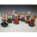 Vintage figures of Snow White and the seven dwarves, characters from the Walt Disney film,