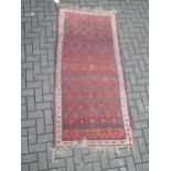 A Kuba style short runner 210 x 96cm