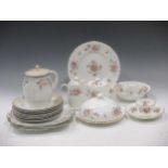 A Wedgwood porcelain part dinner service, a Minton part tea set and a Foley China part coffee