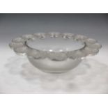 A Lalique glass bowl with repeating flower head border 27cm diameterFootnote: Provenance: Julians