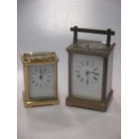 An Edwardian brass carriage clock, 13cm high and a mid 20th century carriage clock (2)Footnote:
