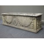 A Haddonstone Adam style rectangular garden planter with central medallion and swag relief