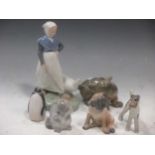 Various Royal Copenhagen figures to include girl with goose, a puppy, mouse, penguin and two dogs (