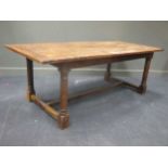 A Colonial Iroko wood dining table, 76 x 213 x 95cm