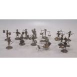 Fourteen 1930's Chinese white metal figures of fisherman, junks etc stamped Hong Kong Sterling,