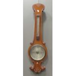 A late Victorian carved oak banjo barometer, 93cm, with silvered dial inscribed for Negretti &