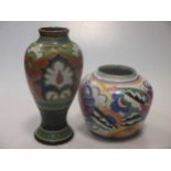 A Gouda vase, 18cm high & a Poole pottery vase, 11cm high (2)