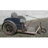 A circas 1950's Carters three wheeled electric invalid carrriageFootnote: Provenance: Julians