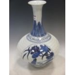 A Chinese blue and white porcelain vase painted with ducks and stylised foliage, signed to the base,