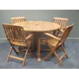 A modern teak folding garden set to include a table and four chairs (table measures: 74cm high and