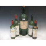 Empty bottles of; Chateau Latour 1971 Nebuchadnezzar bottle, together with a Mouton Rothschild 55