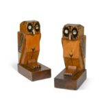 A pair of Art Deco wooden penwork 'owl' bookends,